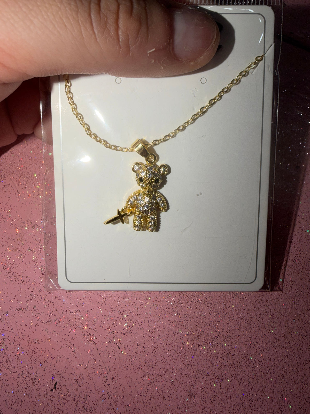 Gold bear necklace with sword