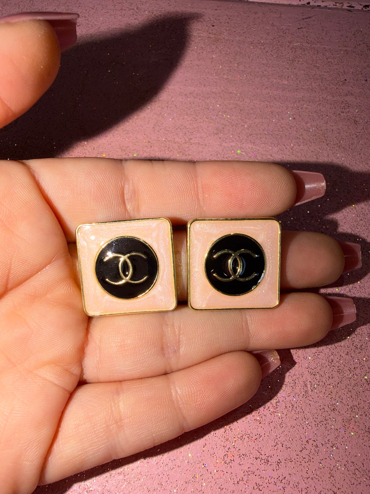 Baby pink and black cc earrings