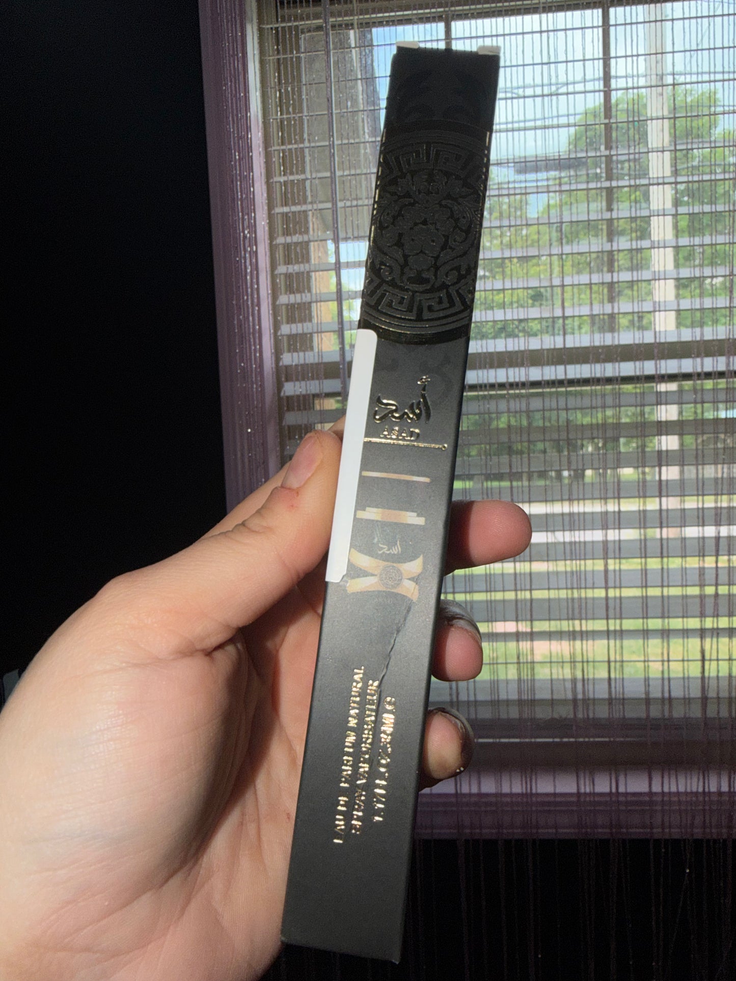 Asad black and gold cologne