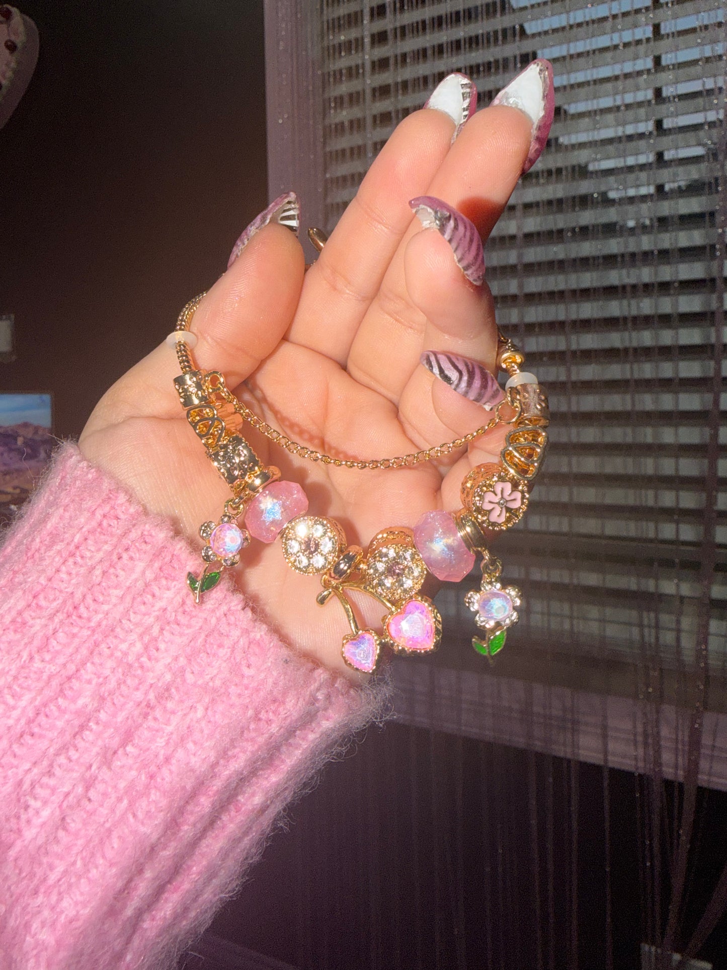 Pink cherry and flower charm bracelet