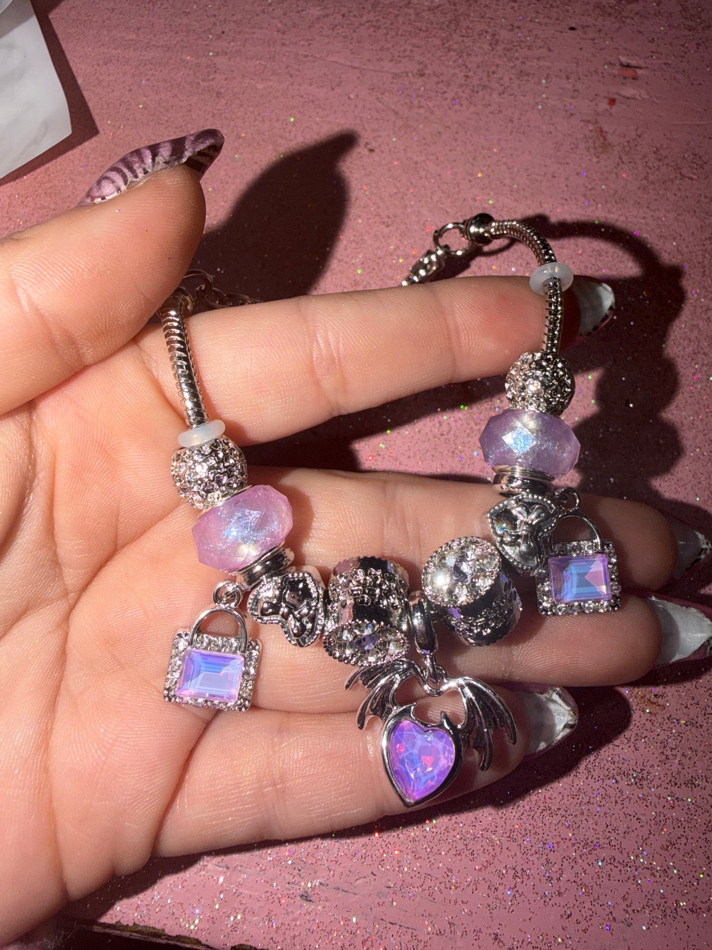 Purple Heart with wings charm bracelet
