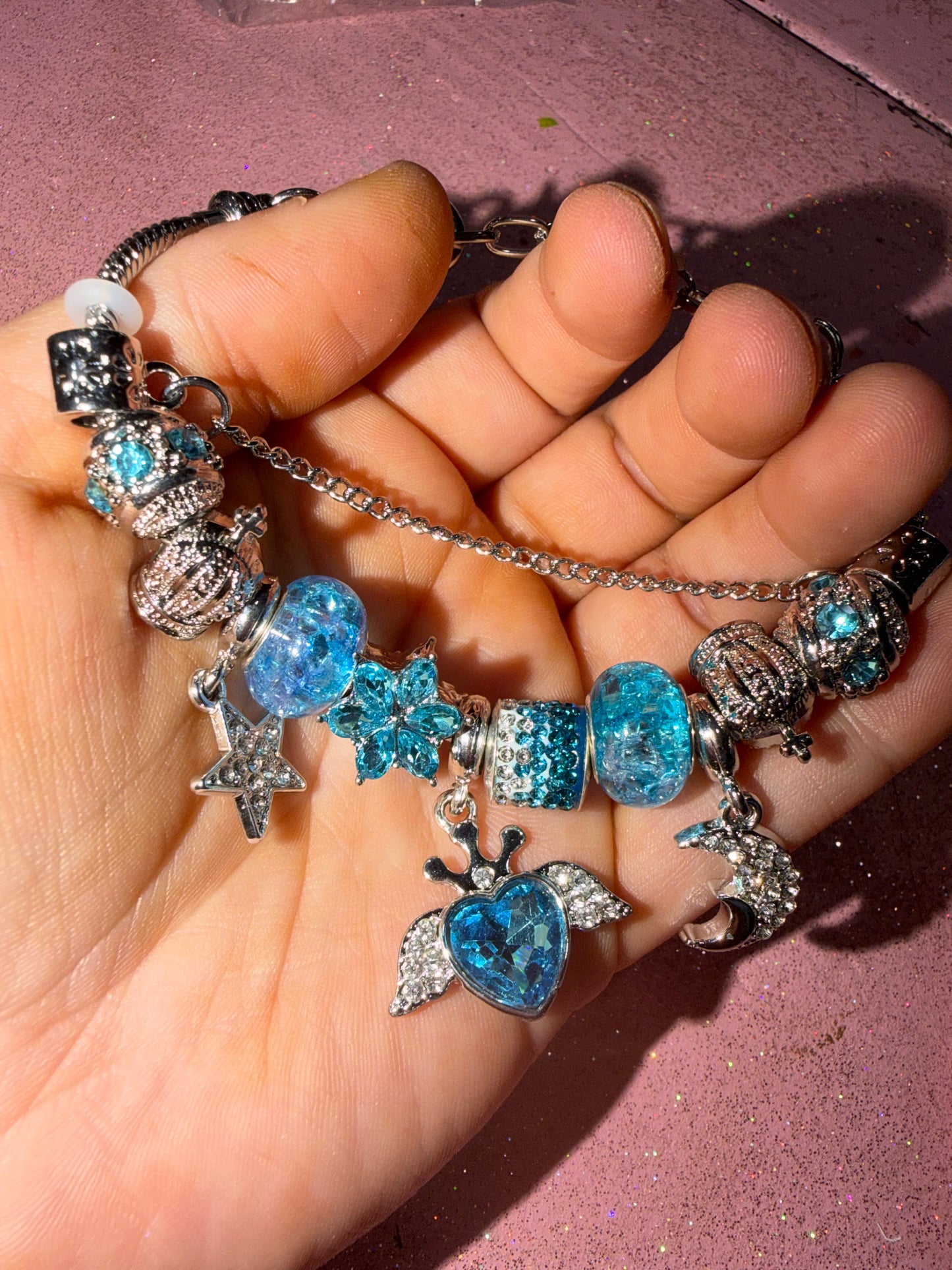 Blue heart with wings charm bracelet