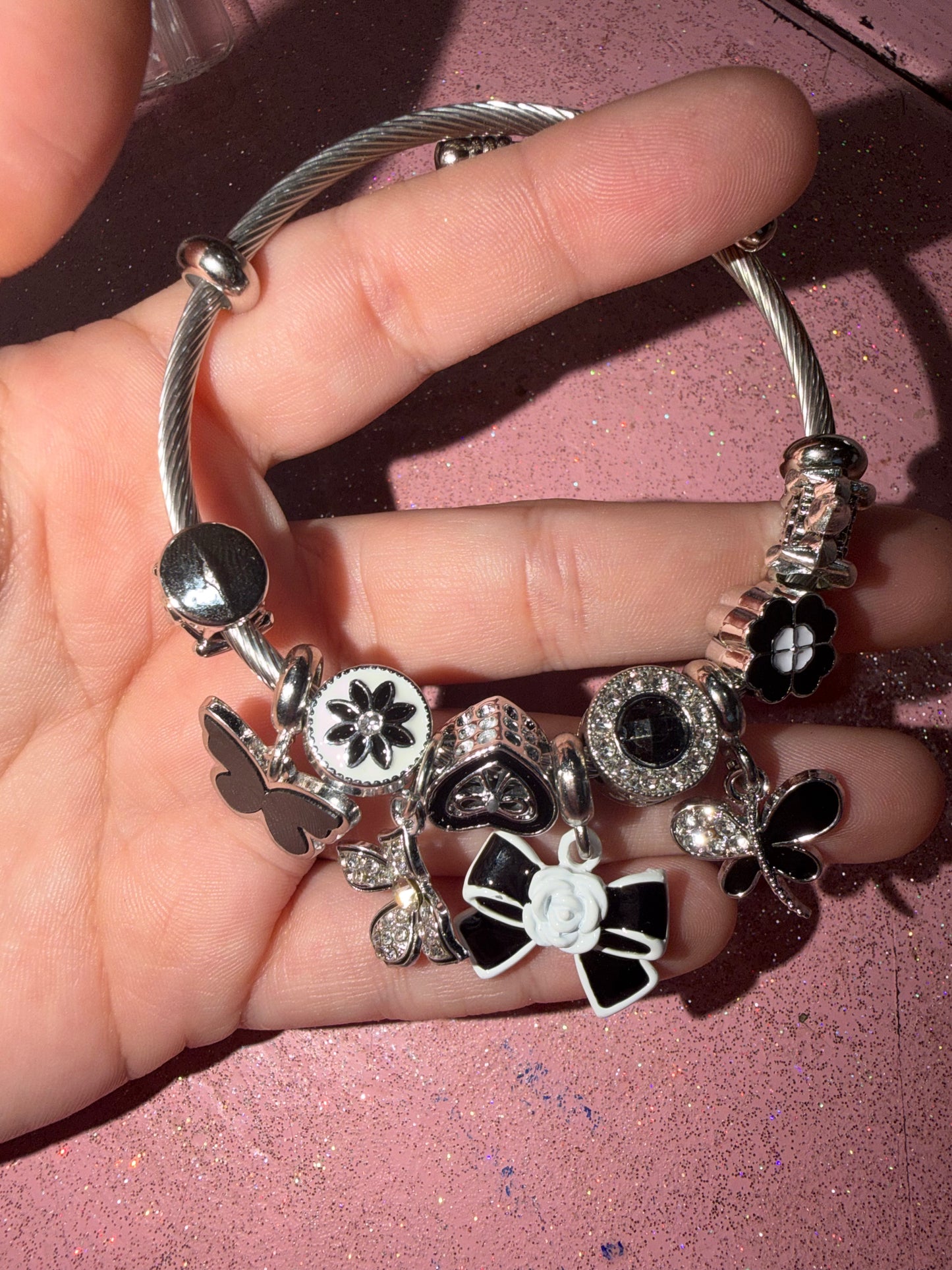 Black and white bow charm bracelet