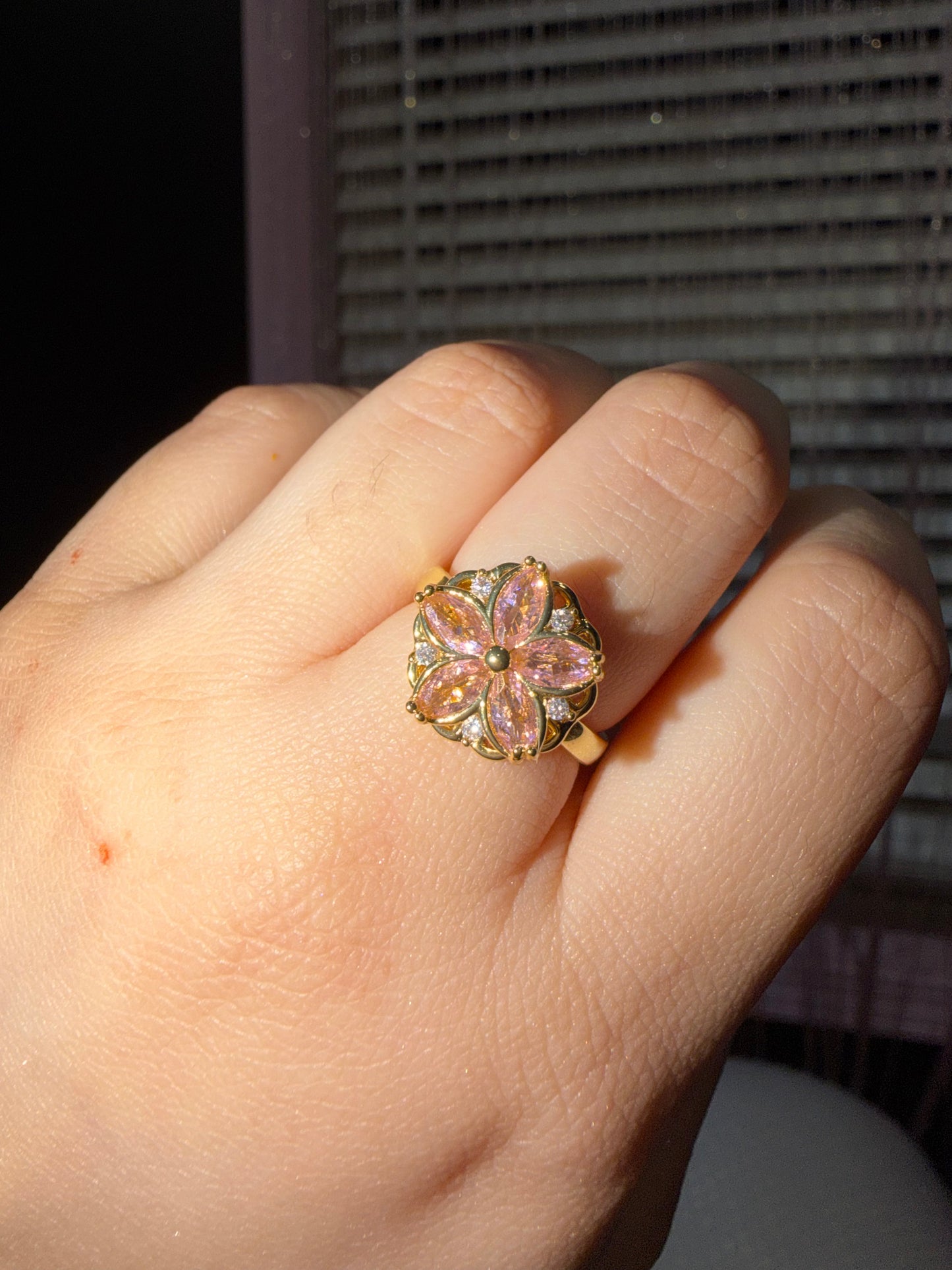 Pink flower fidget spinner ring