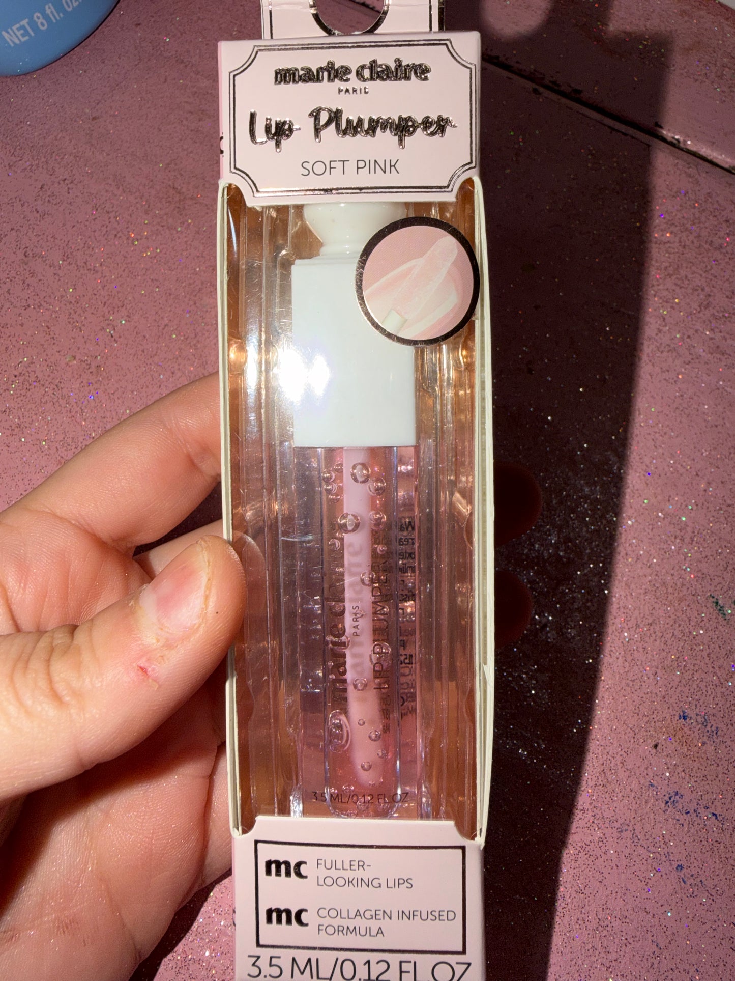 Pink lip plumper