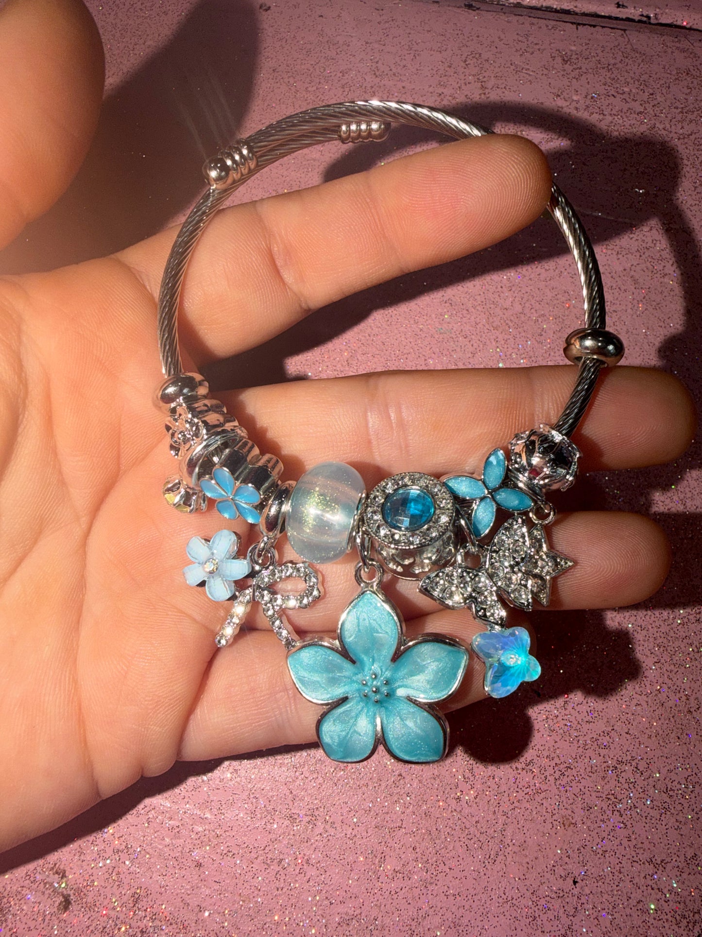 Baby blue flowers charm bracelet