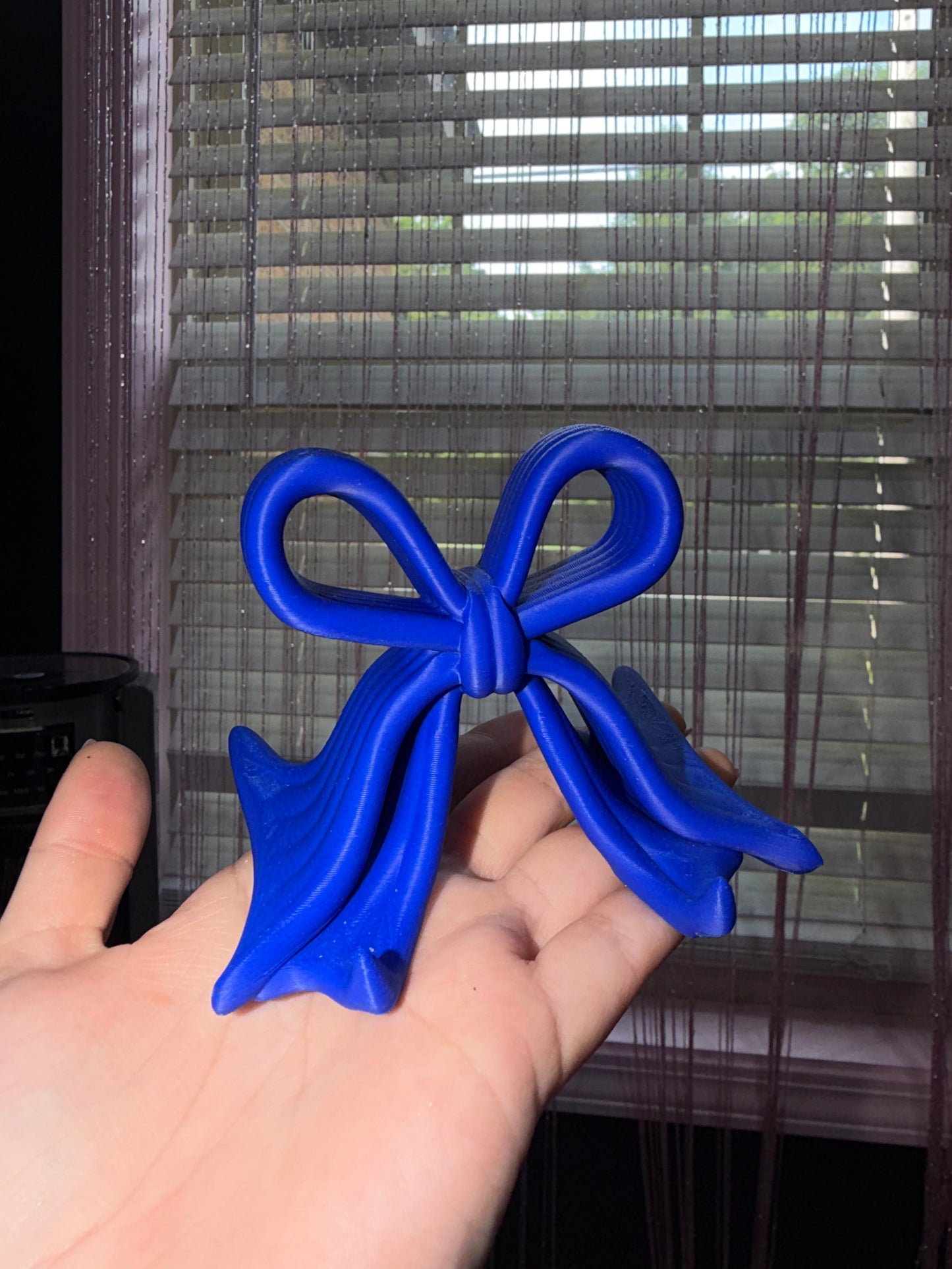 Royal blue bow phone holder