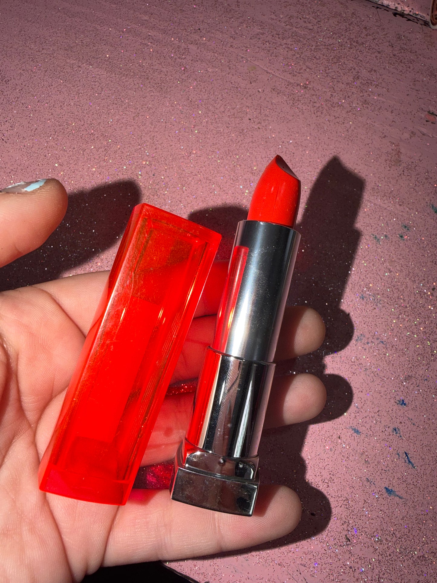 Maybelline lipstick shade “vibrant mandarin”