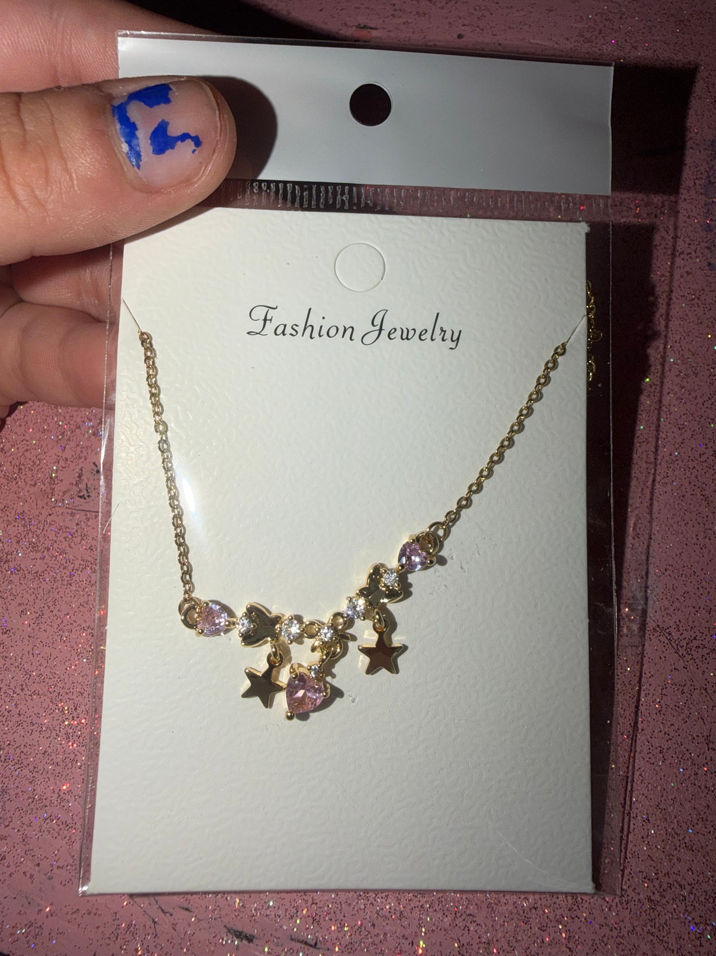 Dangling star and heart necklace