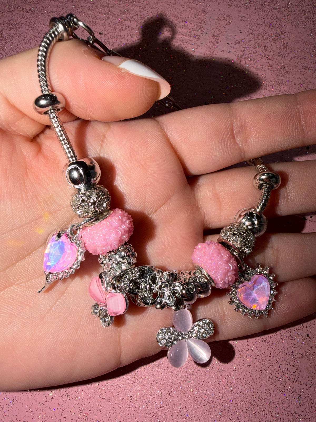 Pink heart and flower charm bracelet
