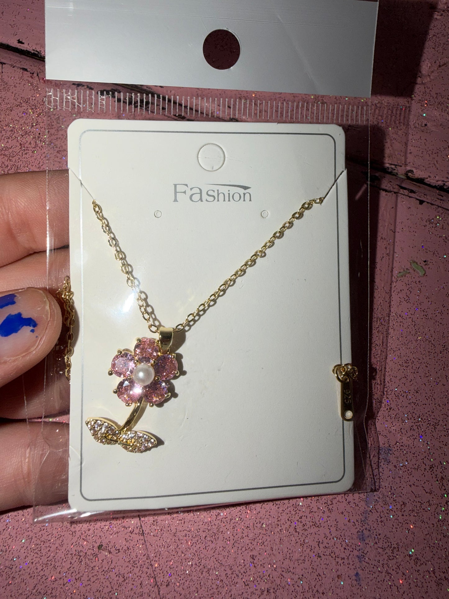 Pink flower and pearl necklace