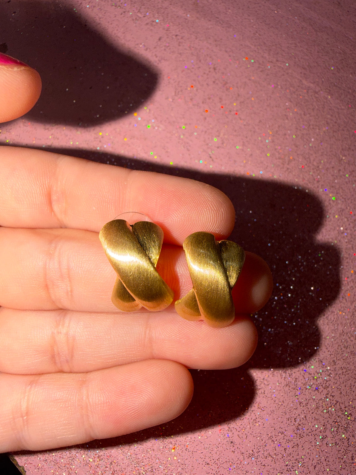 Gold criss cross earrings