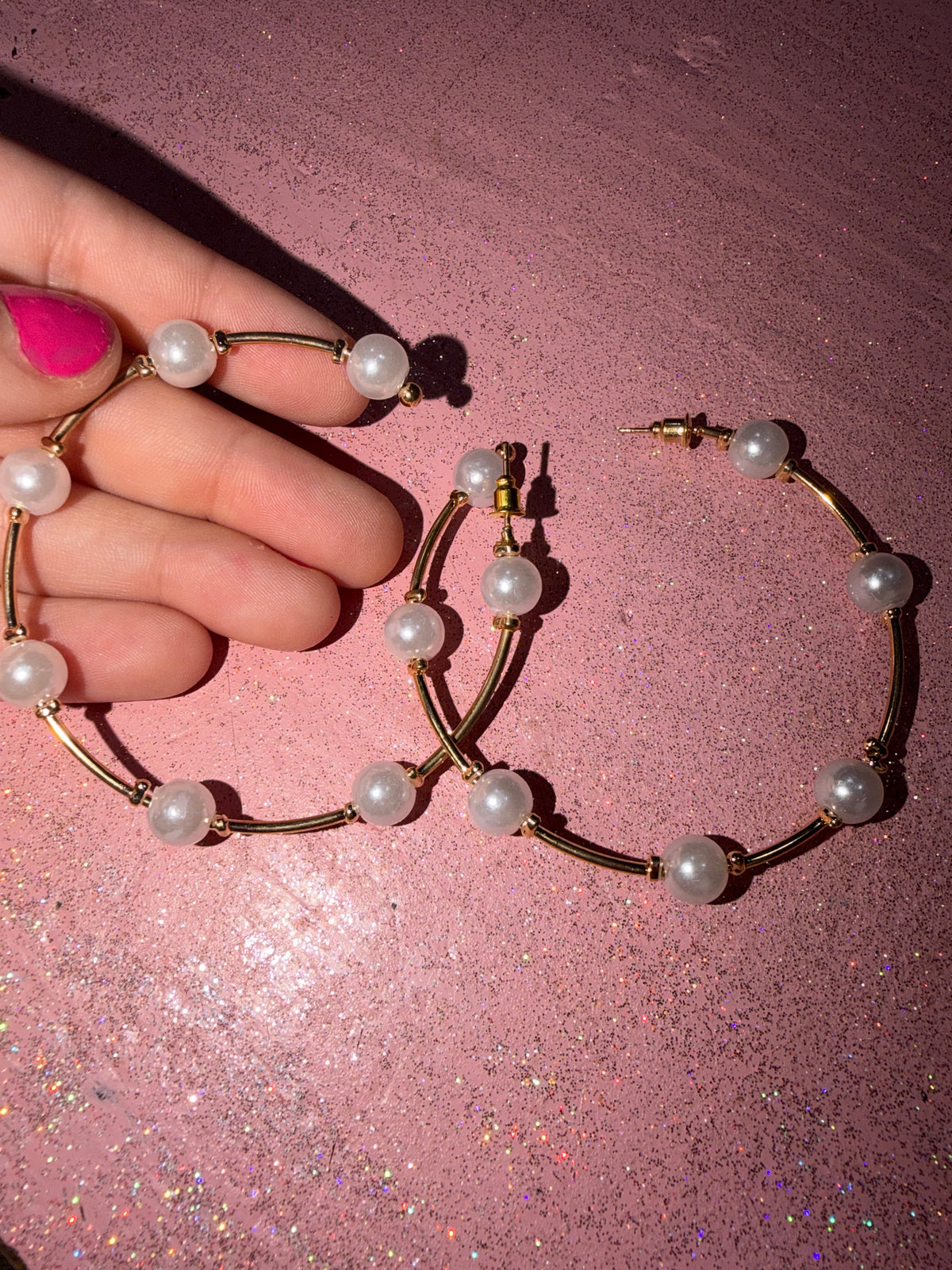 Gold hoop with pearls
