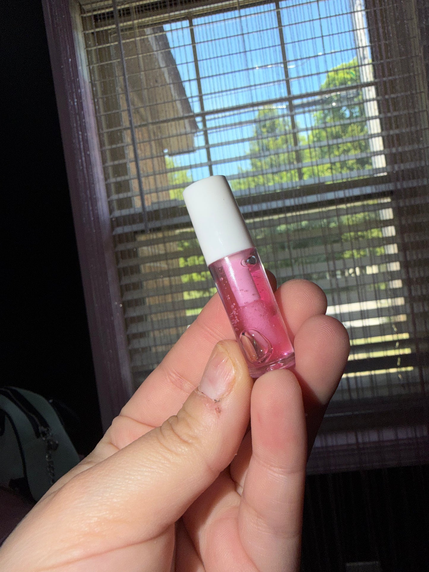 Strawberry pink lip gloss