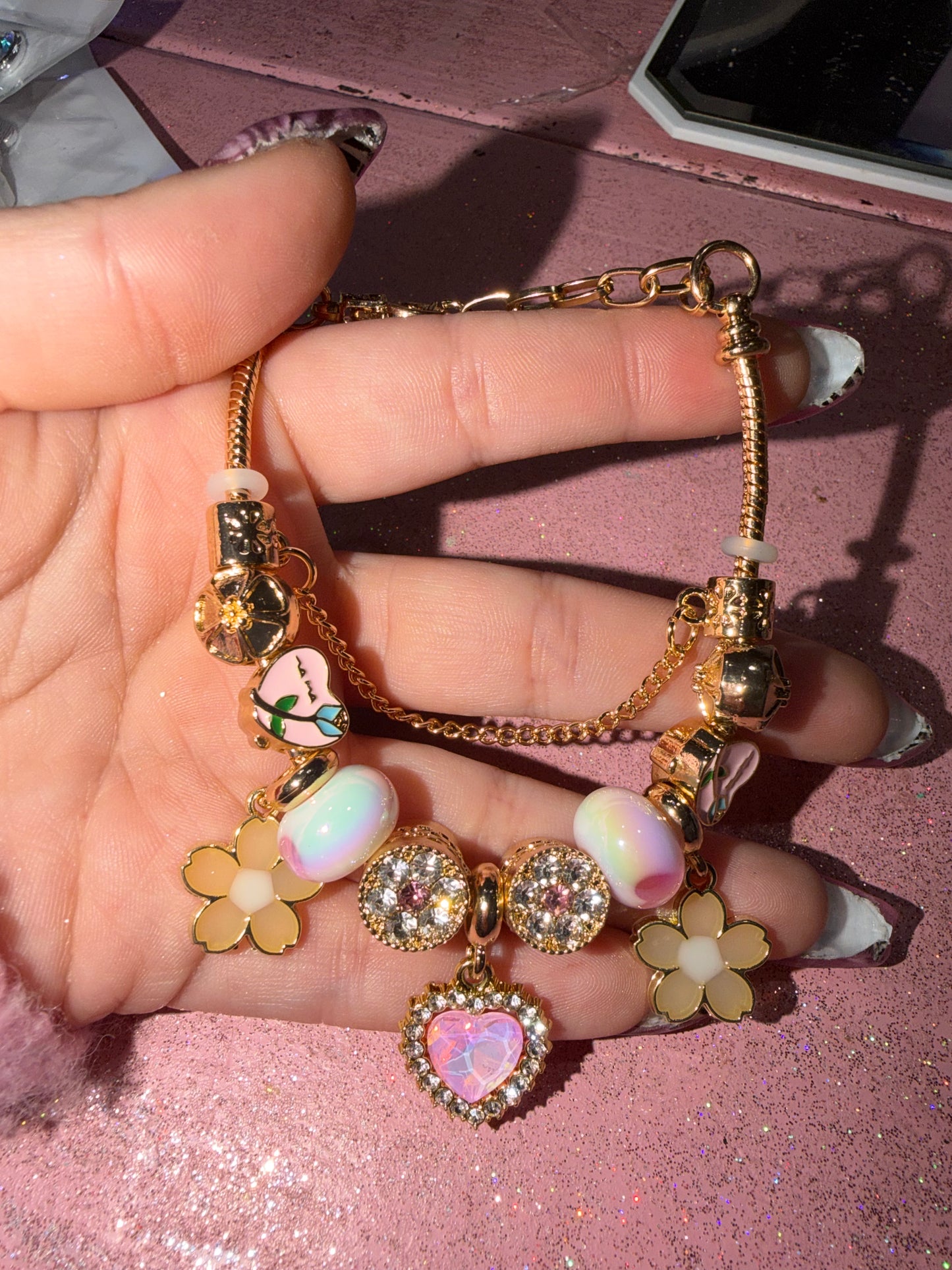 Heart and peach flower charm bracelet