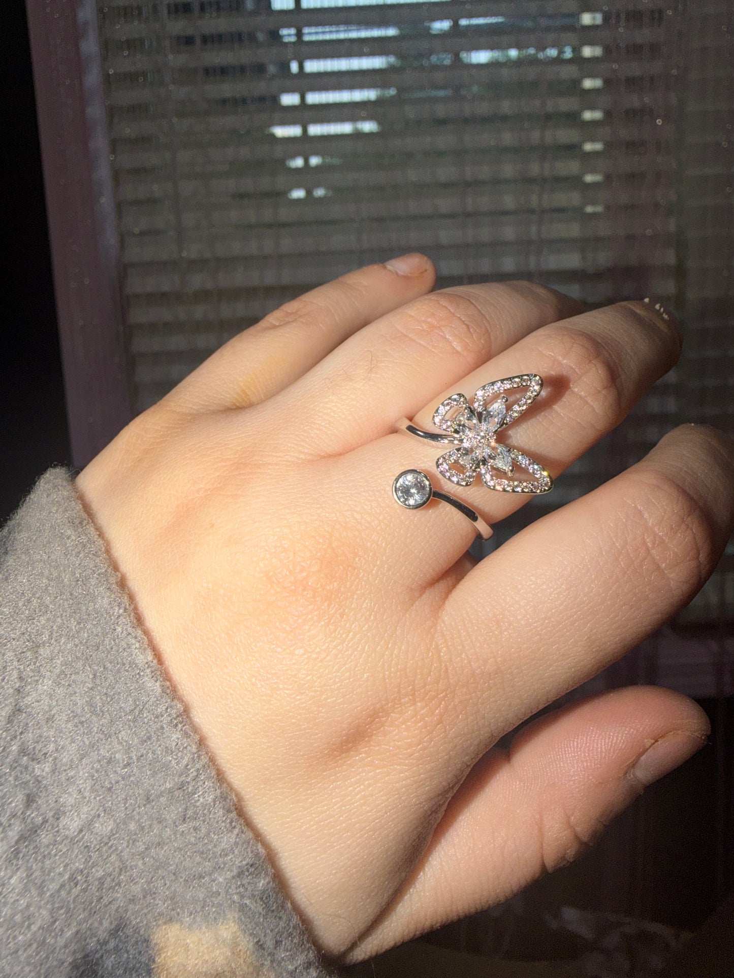 Adjustable butterfly ring