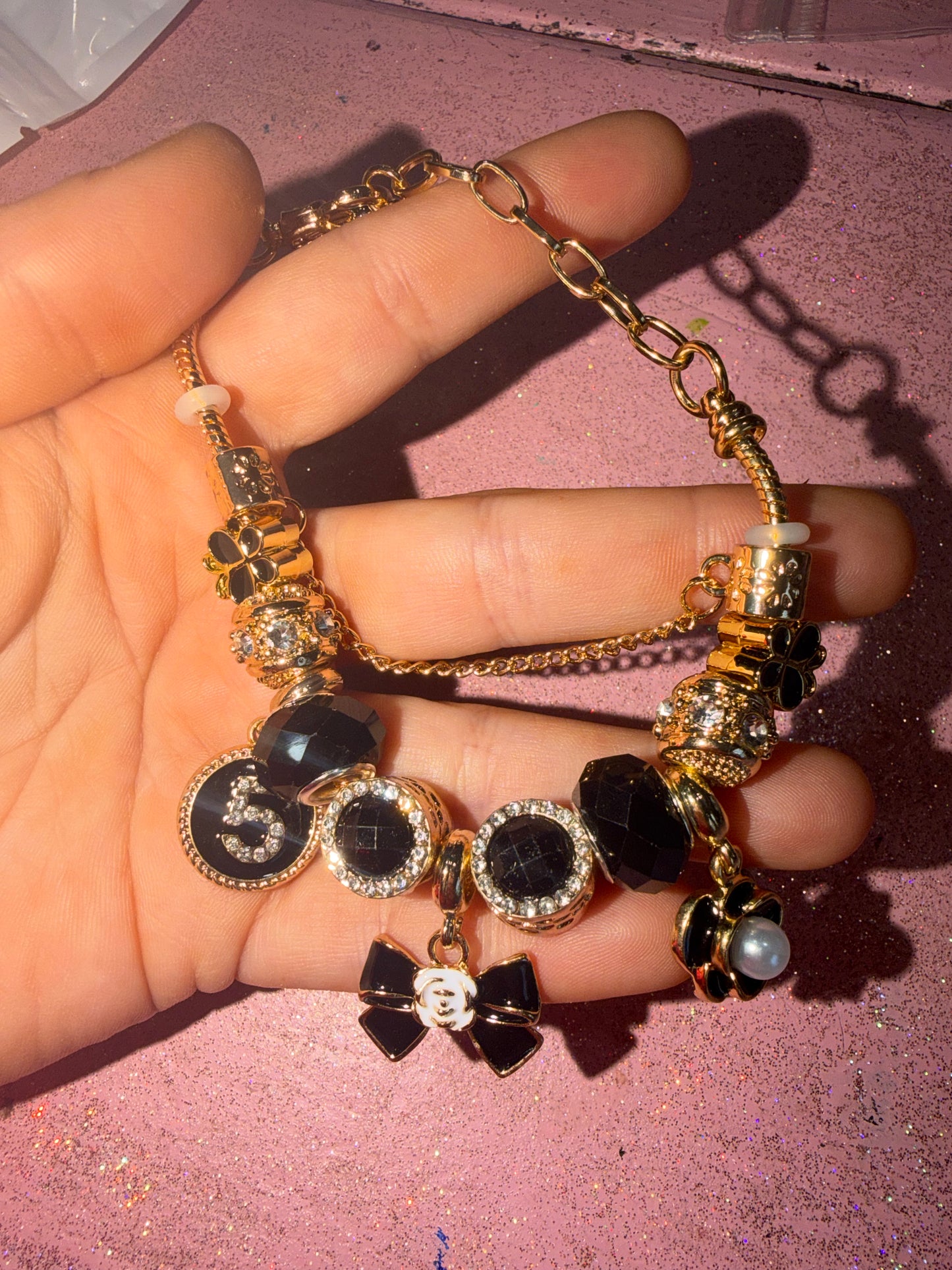 Black charm bracelet with number 5
