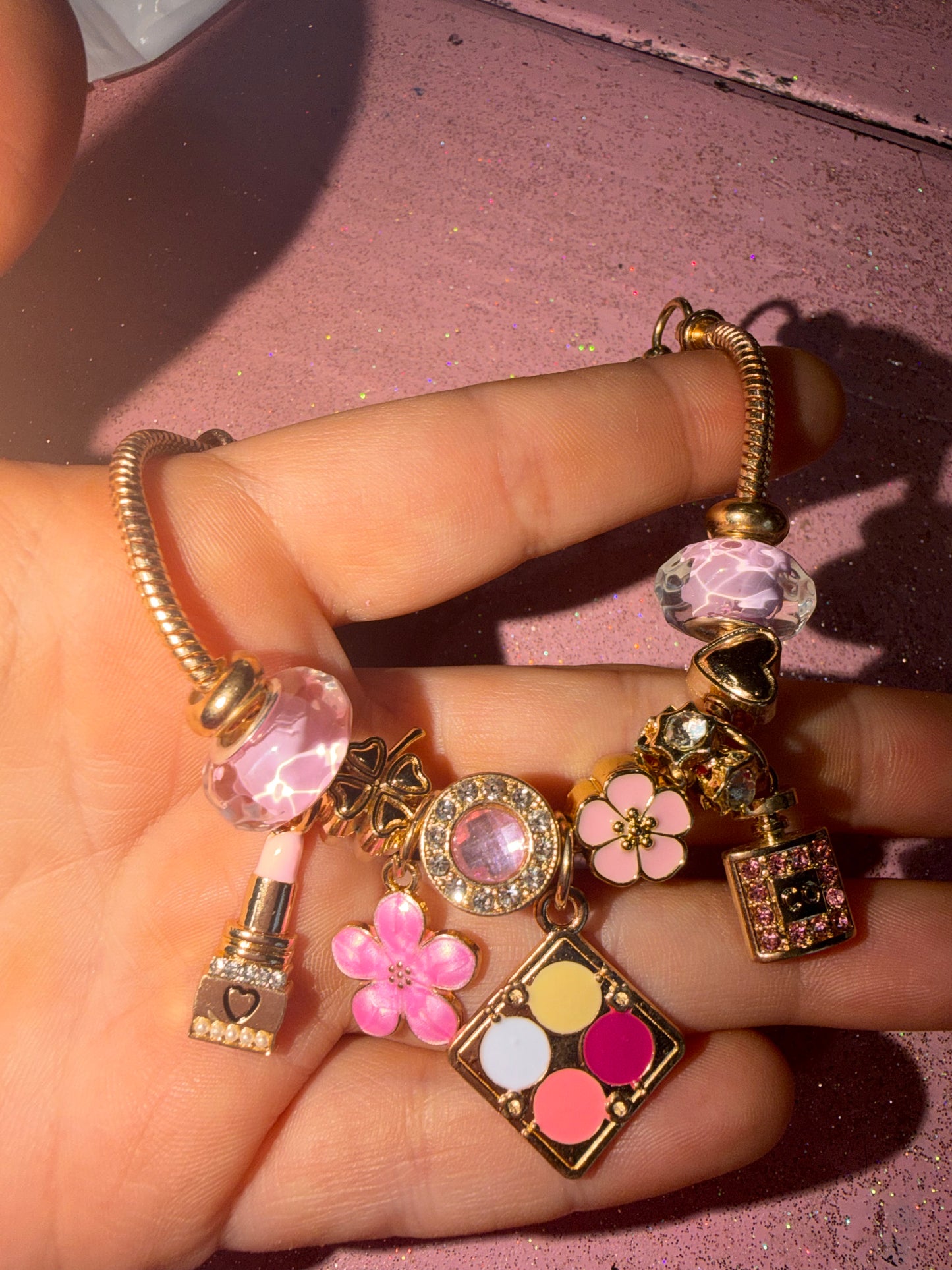 Makeup charm bracelet