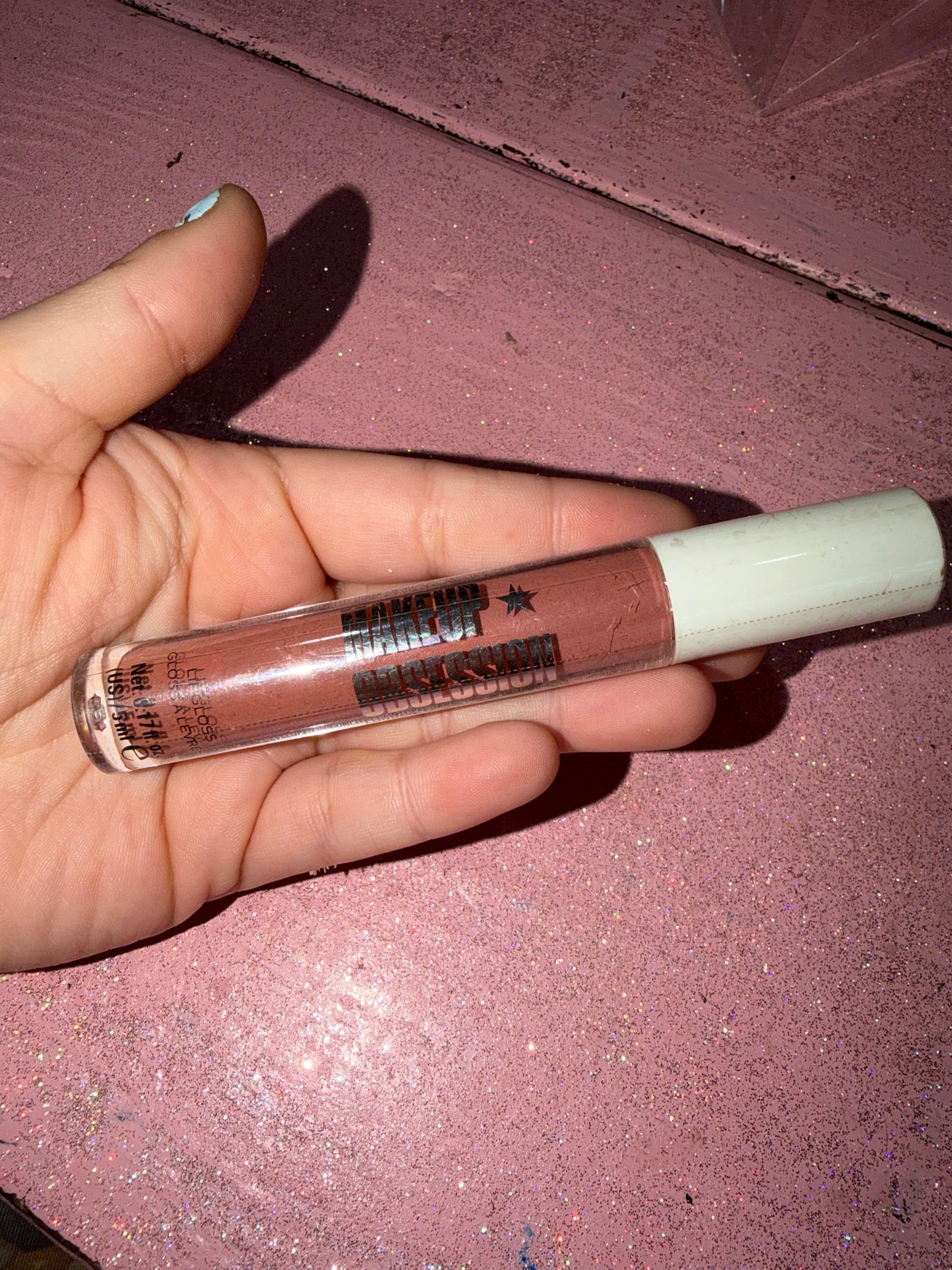 Makeup obsession lip gloss shade “HOOKED”