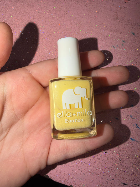 Pastel yellow nail polish