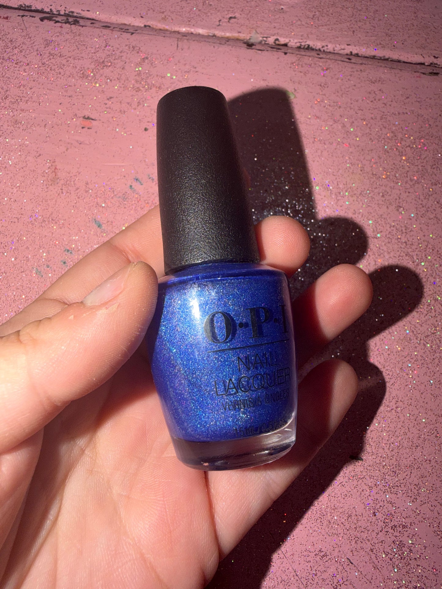 Royal blue glitter nail polish