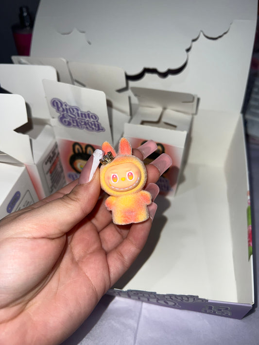 Orange labubu trinket